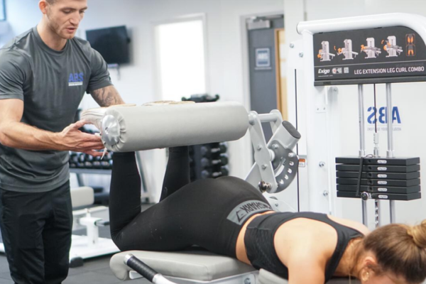 personal training leg curl in Manchester